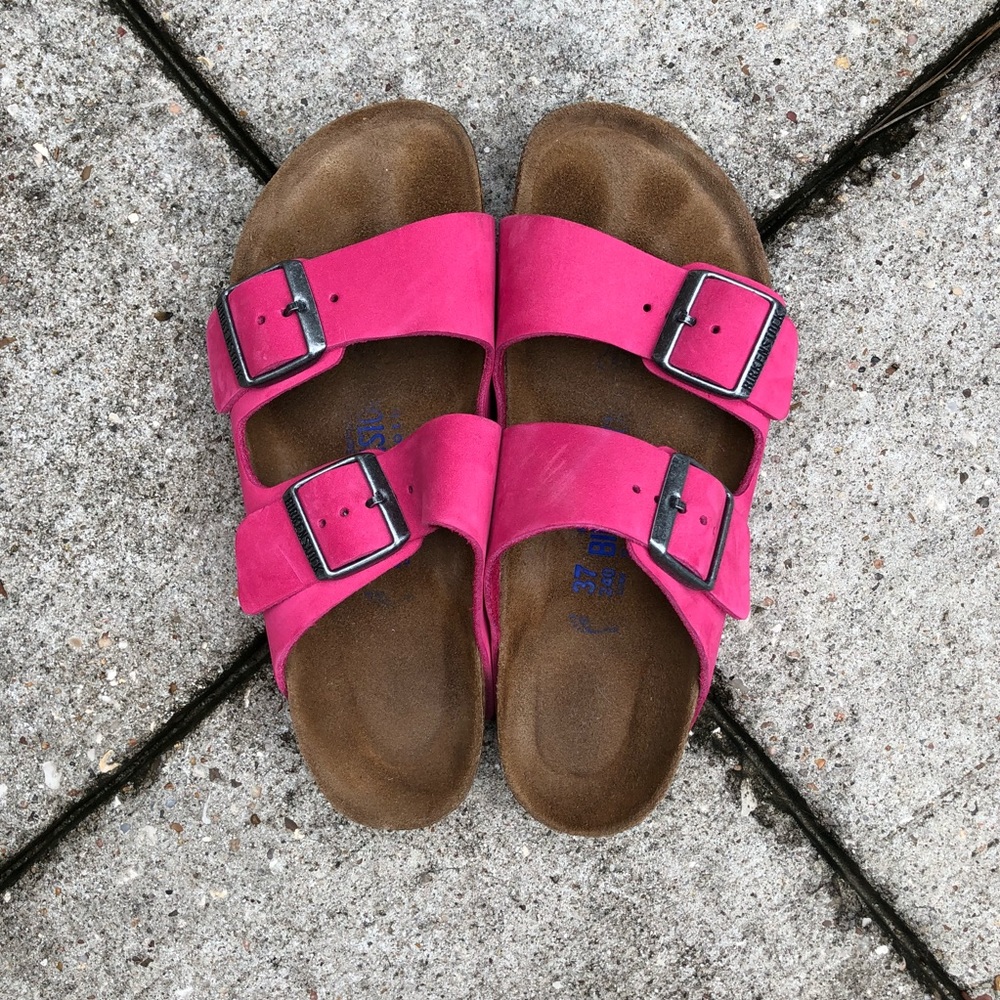 Bright pink Birkenstocks.